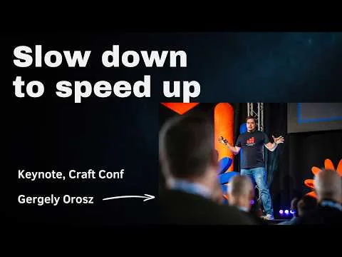 Gergely Orosz speaking at Craft Conf beside the title “Slow down to speed up”